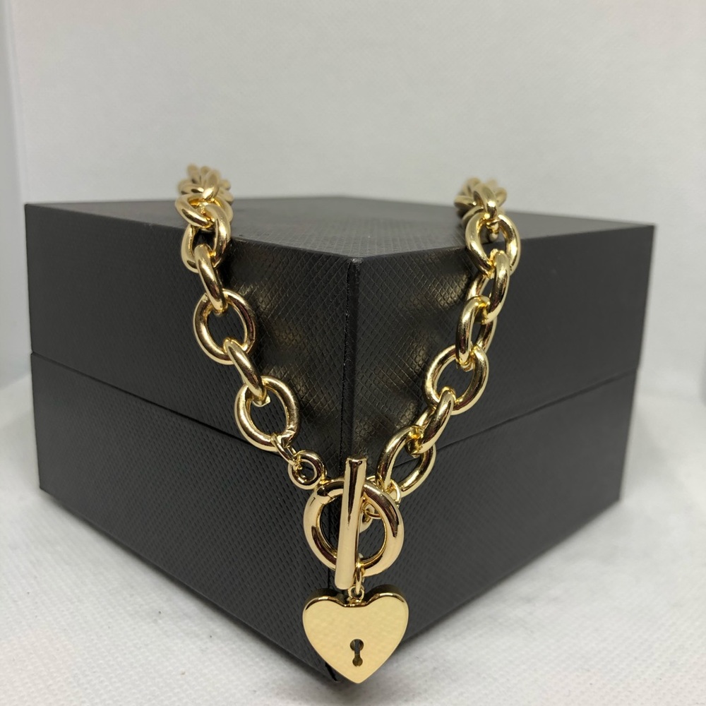 Golden necklace with heart pendant